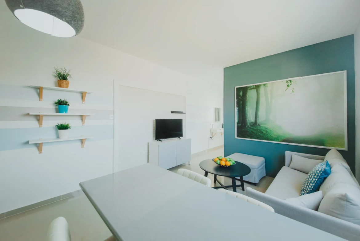 now change this information and replace in the design location: Famagusta, Iskele ready to move in fully furnished and sea view studio 60 m2 price 85,000 gbp Payment Plan 30% Down Payment: £25,500 70% Installment Plan: £59,500 over 24 months with 0% interest Monthly Payment: £2,479 per month and use this image for the property replace the image that as attached